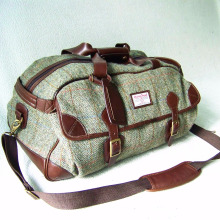 tela de tweed y bolso de viaje de cuero genuino